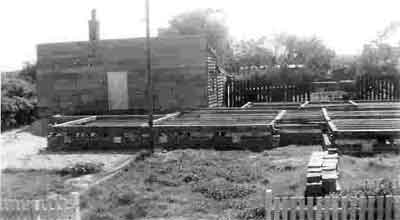 Building on the new house at 4 Flowers Street starts up in front of the remains of the old one.