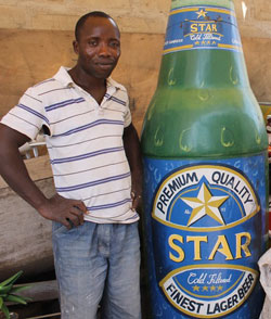 A coffin, which looks like a bottle of beer